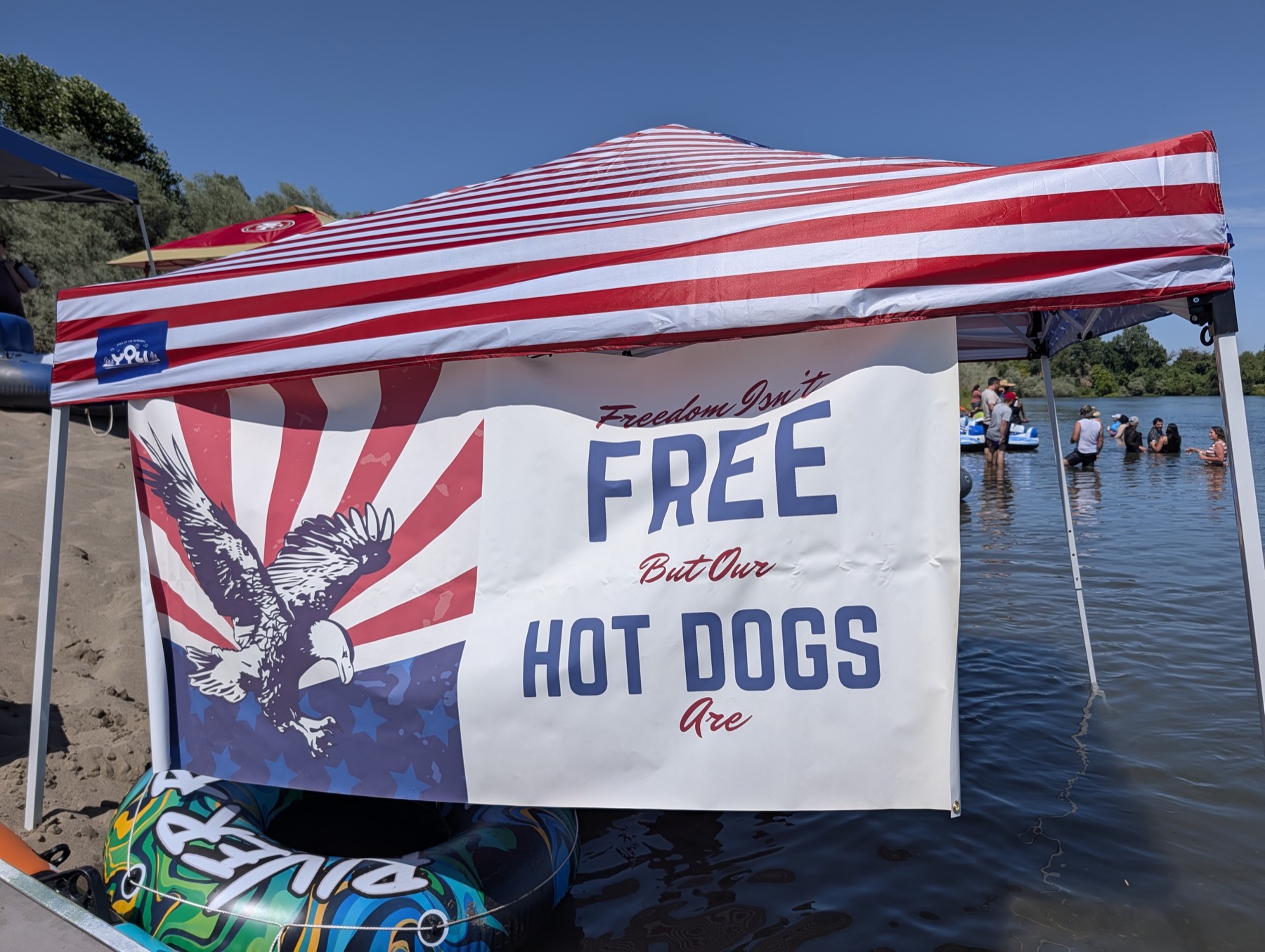 The famous banner: Freedom Isn't Free But Our Hot Dogs Are