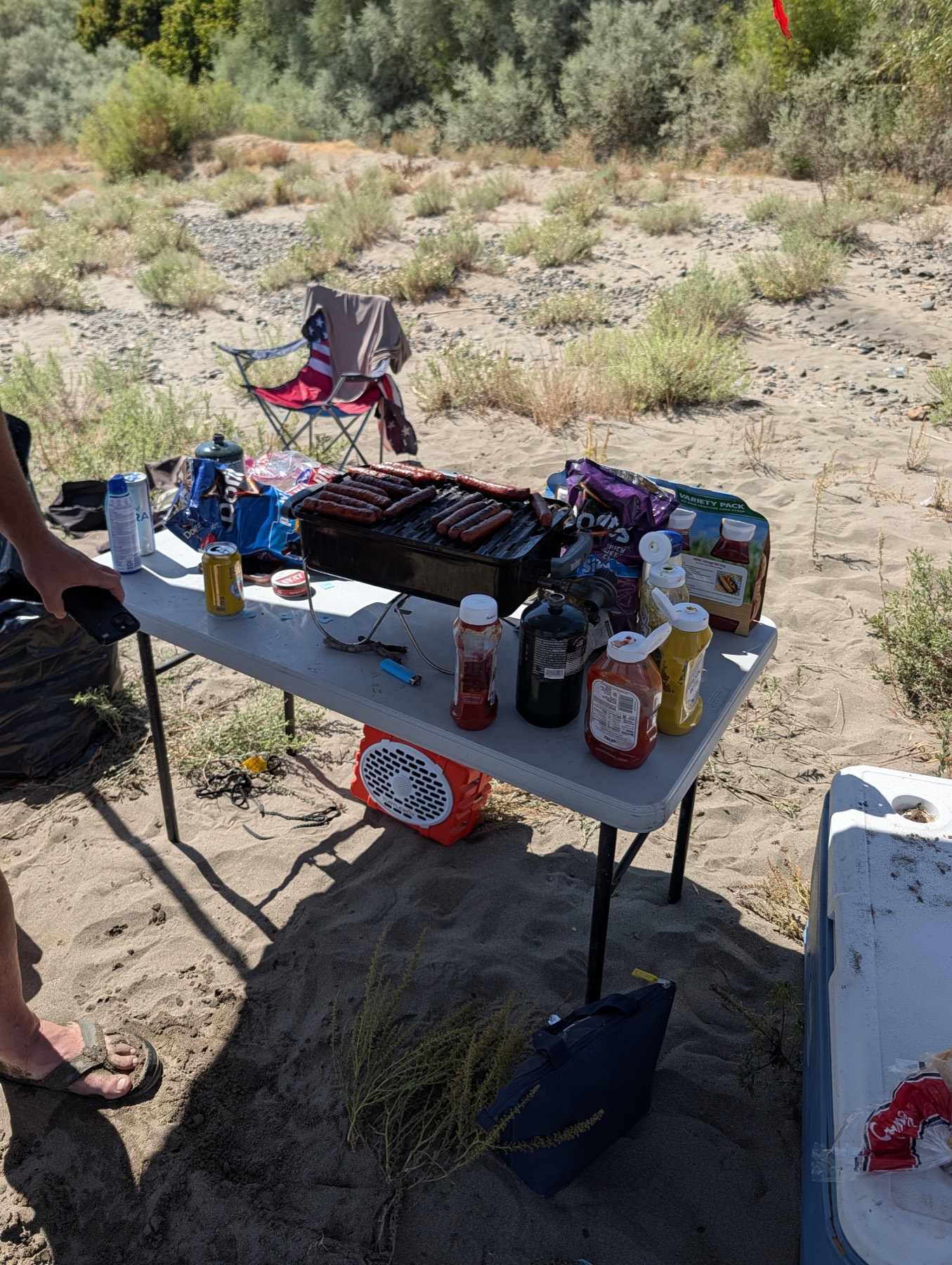 Hot dogs on the grill at Beer Can Beach